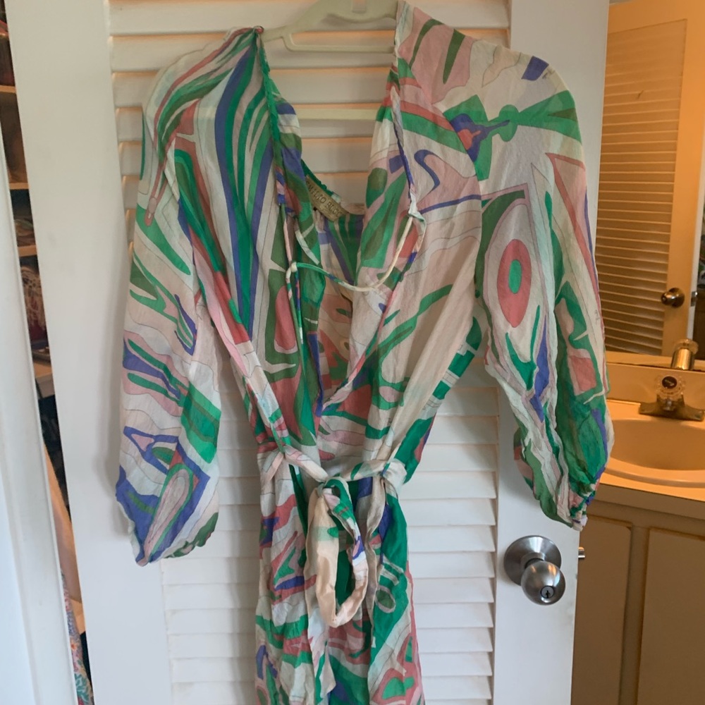 This is an authentic Pucci beach cover up.  It is a sheer silk material.